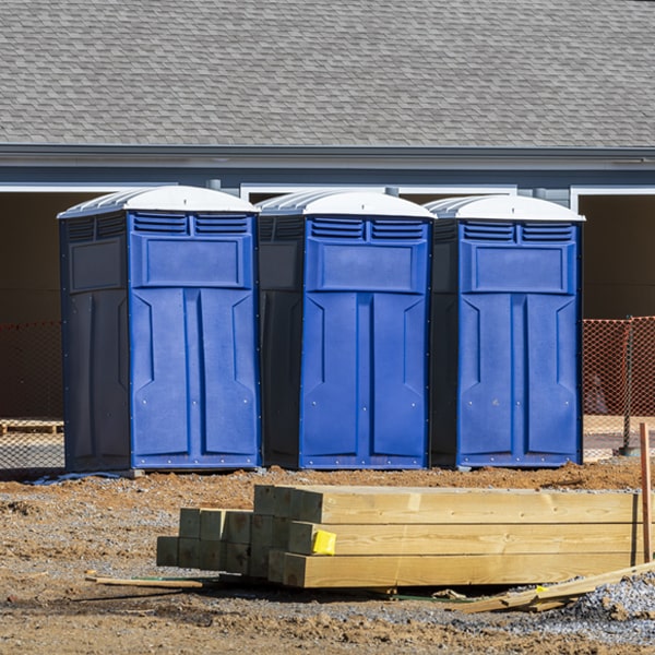 what is the cost difference between standard and deluxe portable toilet rentals in Monrovia